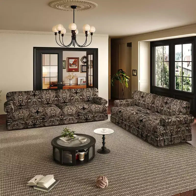 Canapé nuage 4 places luxueusement confortable, en tissu chenille avec accoudoirs roulés et jupe plissée à motif floral noir